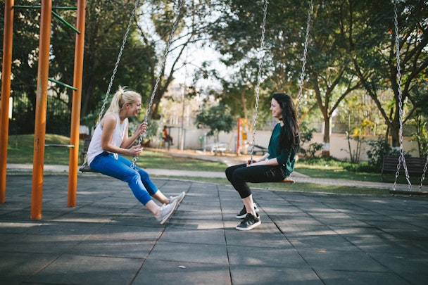 Women on swing set