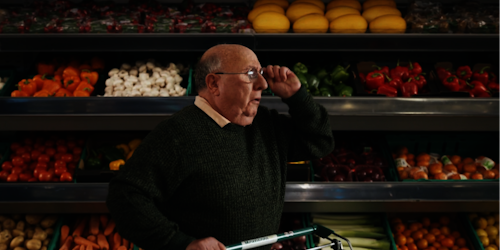 Man in the grocery isle at Morrison 