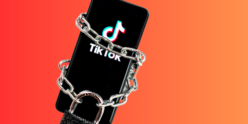 TikTok app on phone in chains and lock