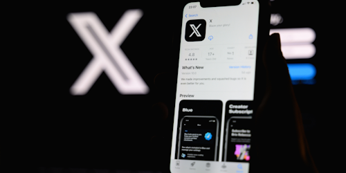 X app on mobile phone display